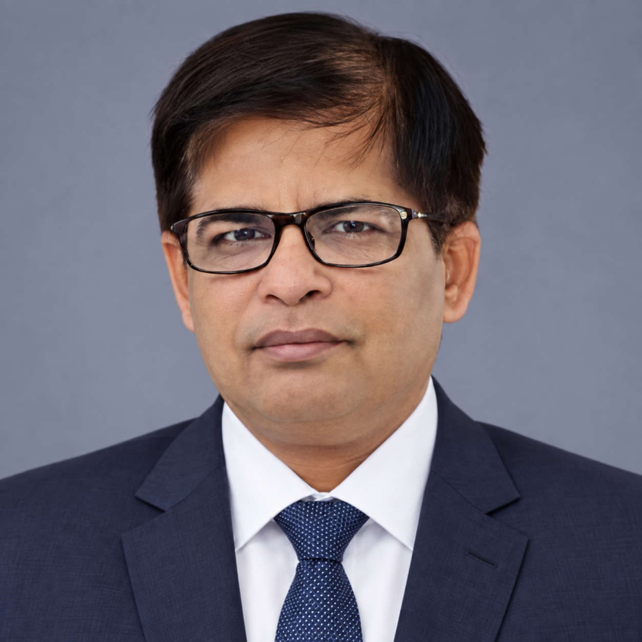 Mr. Dharmesh Kansara, Principal Consultant at iconiaHR, in professional attire
